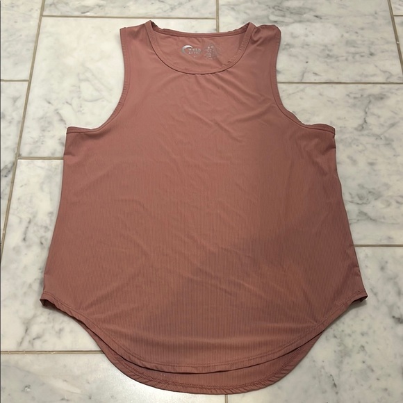 Dusty rose Sleeveless Tank Top. Stretchy but runs a bit large. - Picture 1 of 2